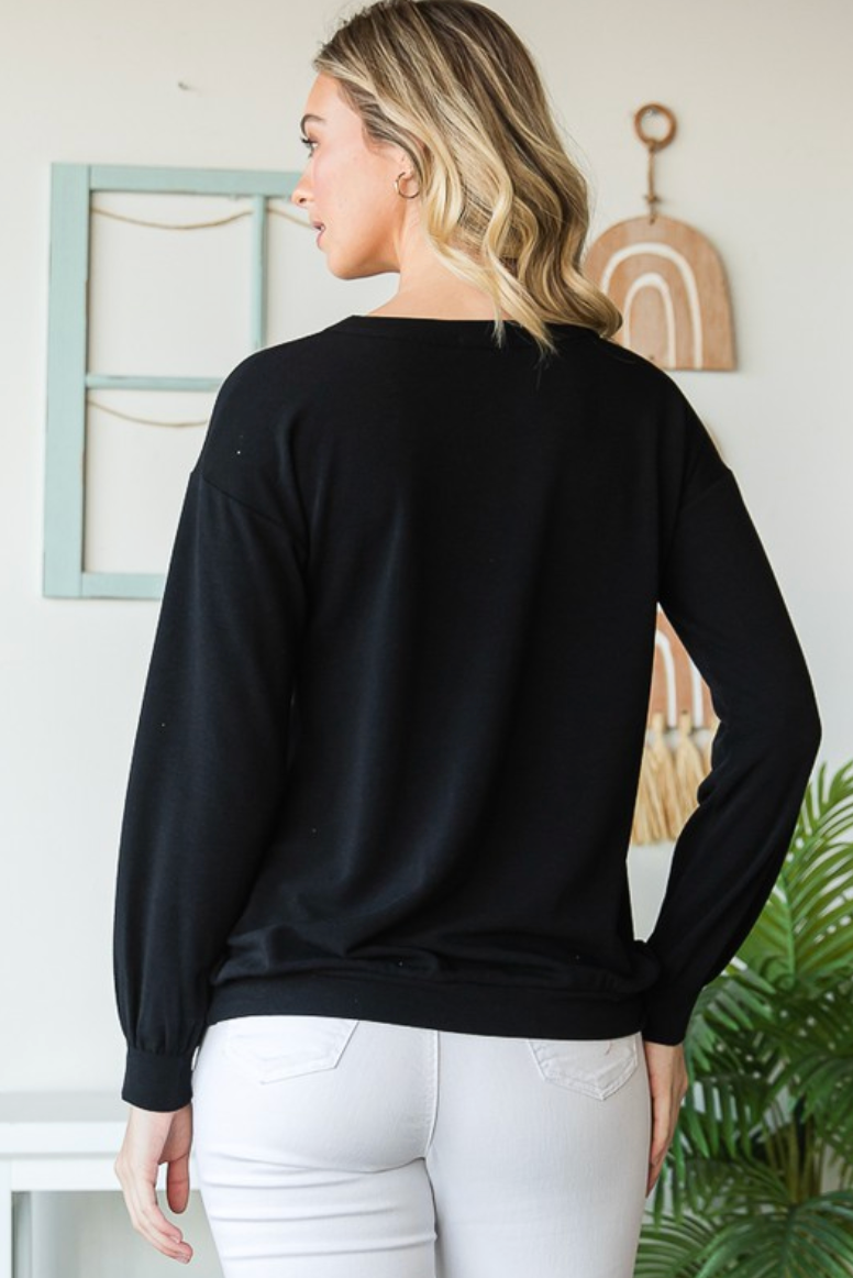 LOVE letters on black long sleeve top
