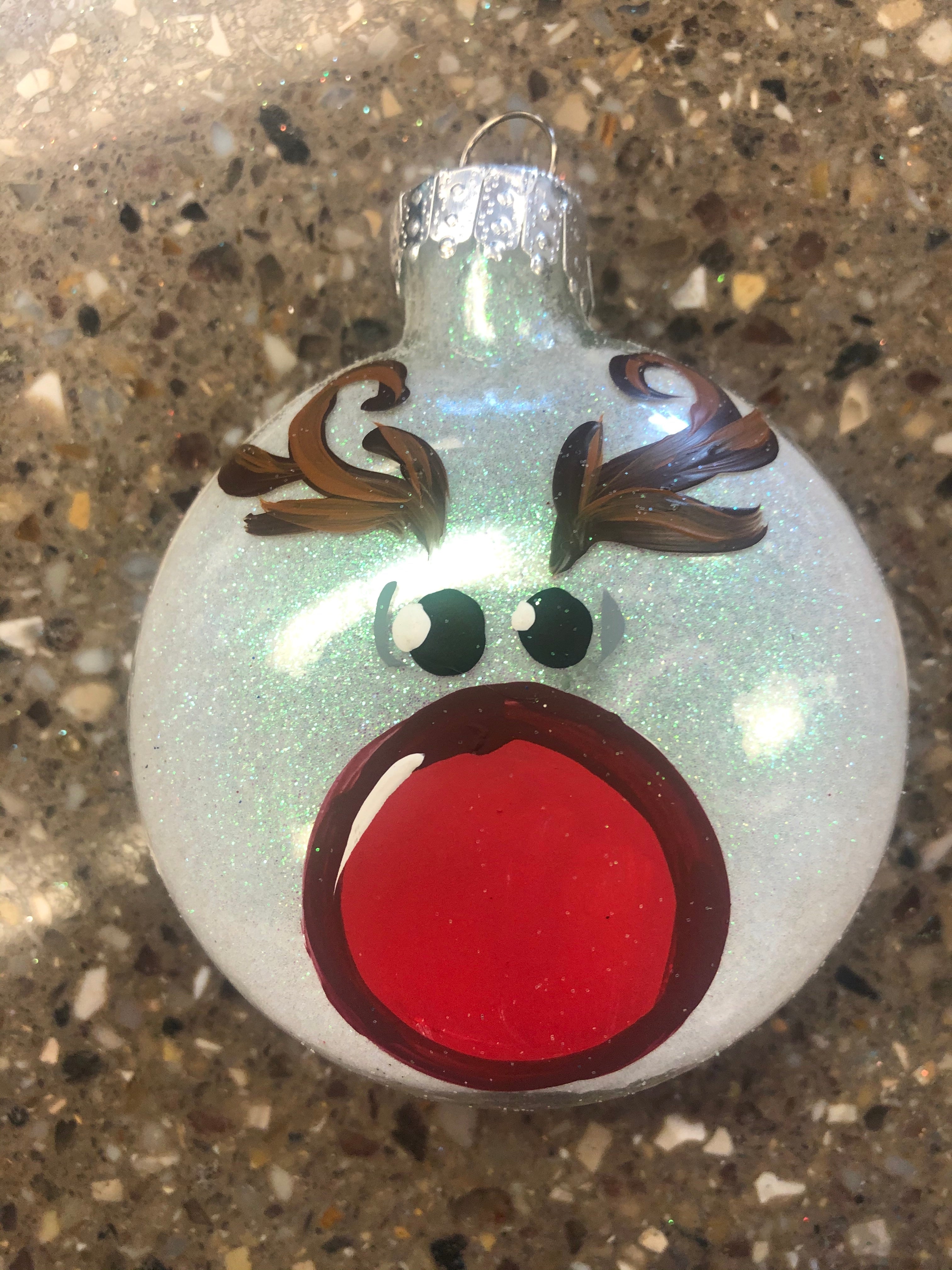 Hand painted and glittered glass ornaments